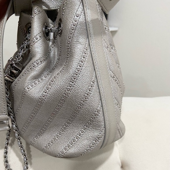 Chanel drawstring Metallic Calfskin Studded Chevron Quilted Crossbody - Picture 9 of 13